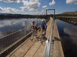 Riding across the Bonnie Doon bridge on the Great Victorian Rail Trail