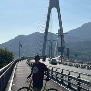 riding the shimanami Kaido on a cycling tour in Japan